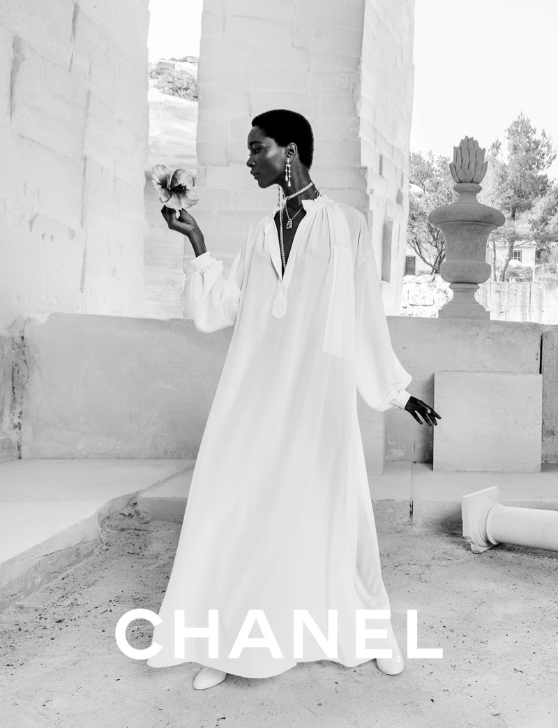 Mahany Pery appears in Chanel cruise 2022 campaign.