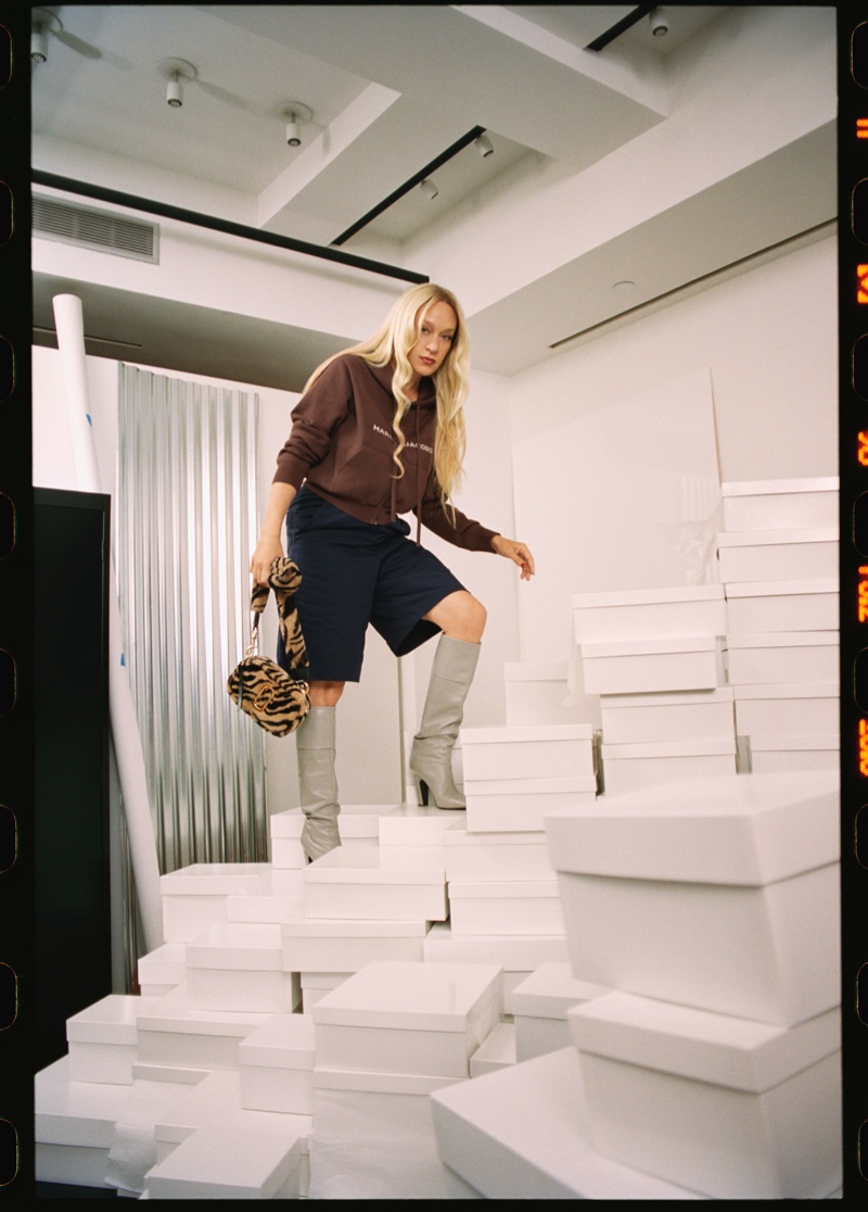 Posing with boxes, Chloe Sevigny fronts Marc Jacobs resort 2021 campaign.