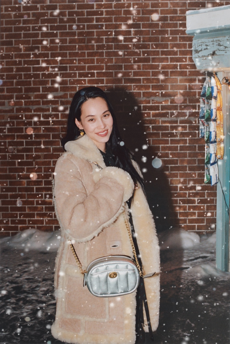 Kiko Mizuhara poses for Coach Holiday 2021 campaign.