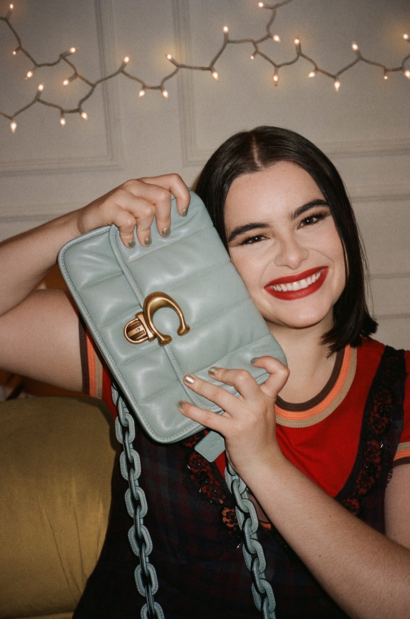 All smiles, Barbie Ferreira fronts Coach Holiday 2021 campaign.