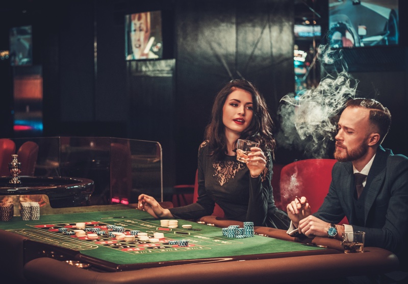 Couple elegant casino drink