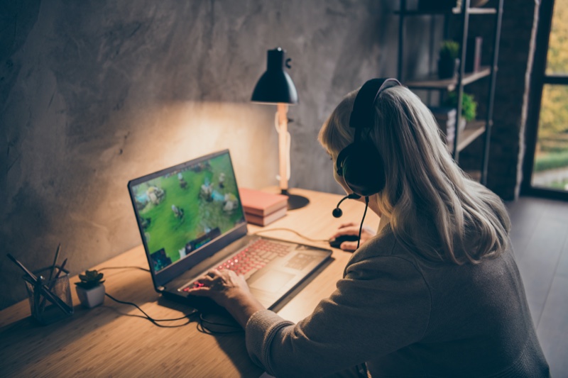 Girl Playing Laptop Game Home Headset