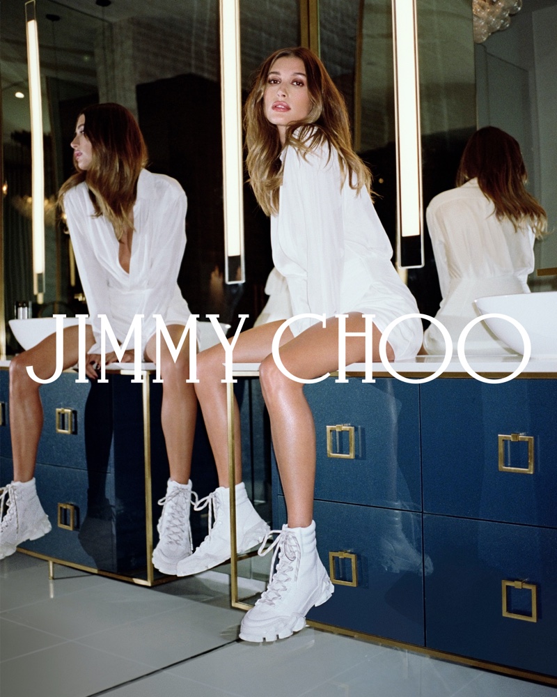 Dressed in white, Hailey Bieber fronts Jimmy Choo winter 2021 campaign.