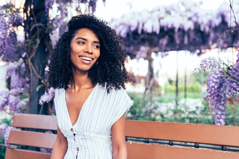 Happy Black Woman Park Bench Flowers