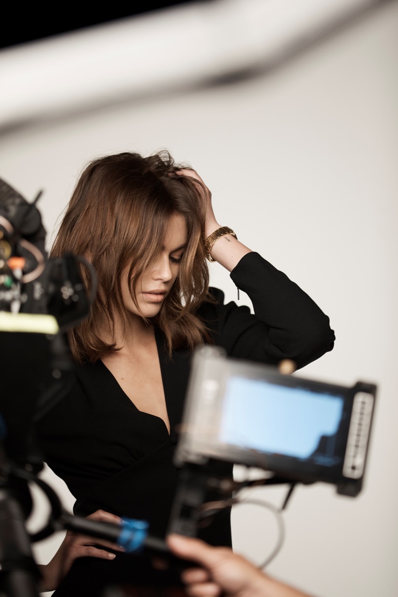 Model Kaia Gerber poses behind the scenes on OMEGA Constellation shoot.