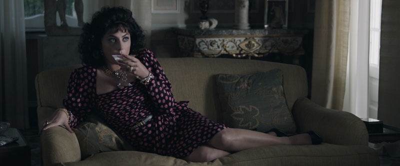 Wearing a vintage Yves Saint Laurent dress, Lady Gaga plays Patrizia Reggiani in House of Gucci. | Photo Credit: Courtesy of Metro Goldwyn Mayer Pictures Inc.  