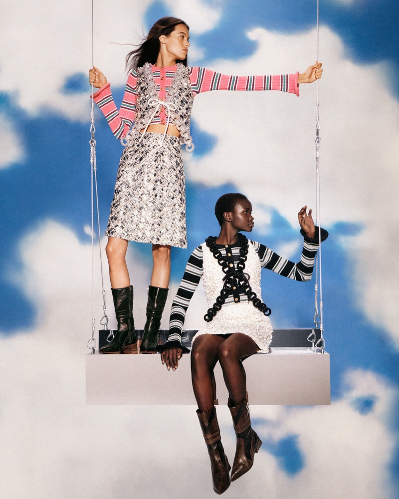 Models Grace Valentine and Akon Changkou front Louis Vuitton cruise 2022 campaign.