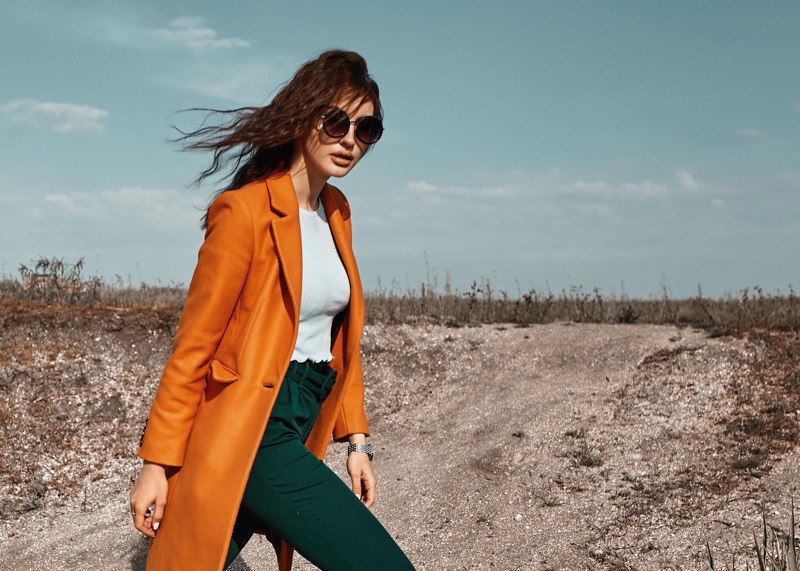 Model Orange Coat Green Pants Outfit