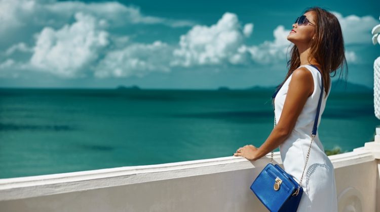 Model White Dress Blue Handbag Vacation Look