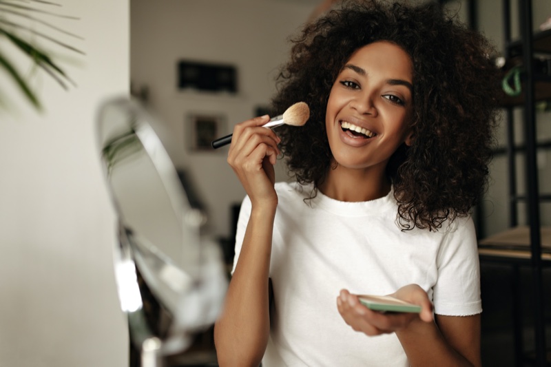 Smiling Black Woman Makeup Brush Foundation