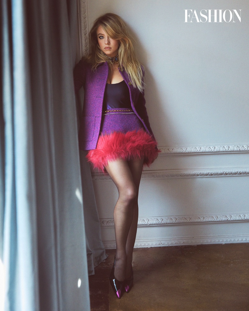Sydney Sweeney stands out in purple and red outfit from Saint Laurent. Photo: Greg Swales / FASHION