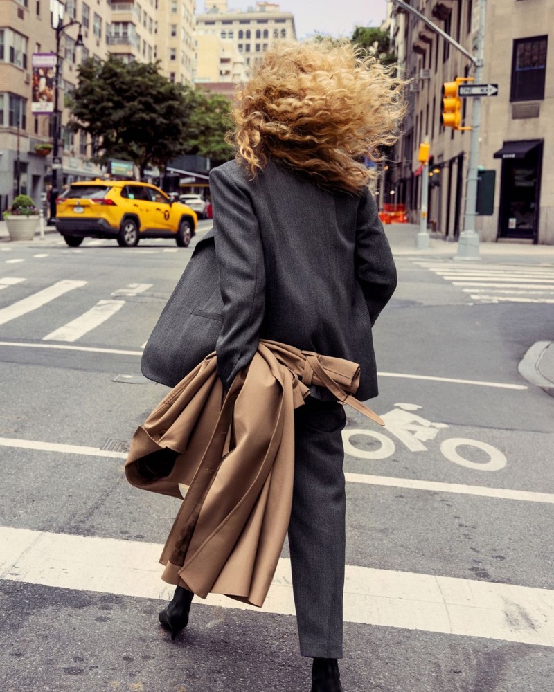 The model walks New York City streets for Totême fall-winter 2021 campaign.
