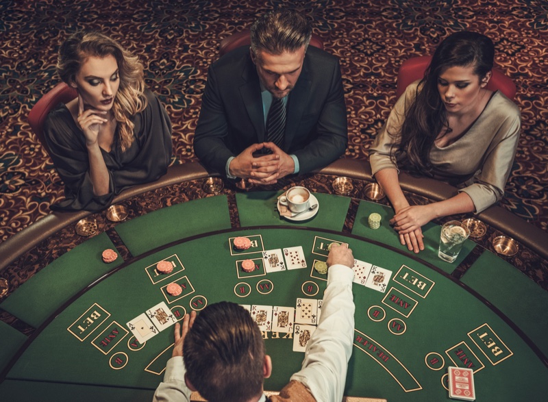 Two Women Man Casino Table Elegant Cards