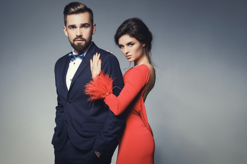 Well Dressed Couple Woman red dress Man Suit