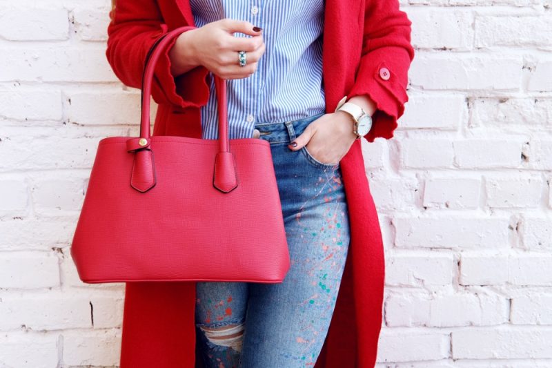 Woman with Red Leather Bag