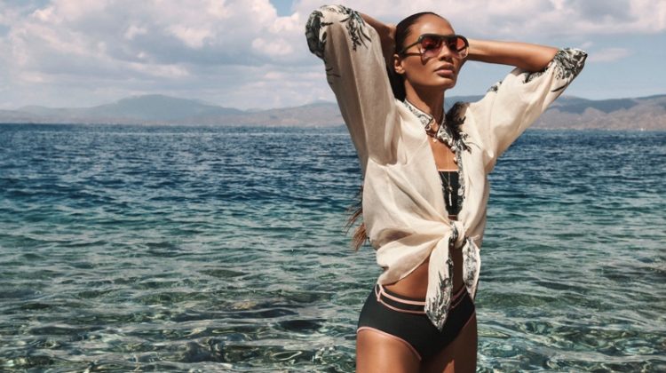 Posing in Greece, Joan Smalls fronts Zimmermann Resort 2022 Swim campaign.