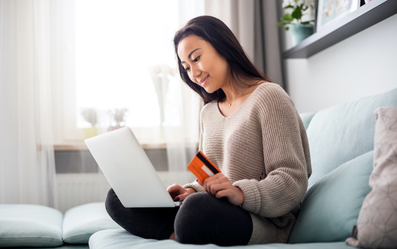 Asian Woman Online Shopping Laptop Credit Card