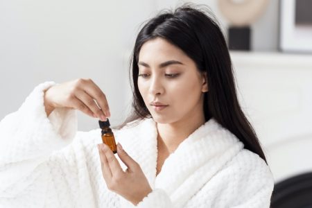 How to Get Good Deals When You Buy CBD Attractive Woman Oil Bottle Robe