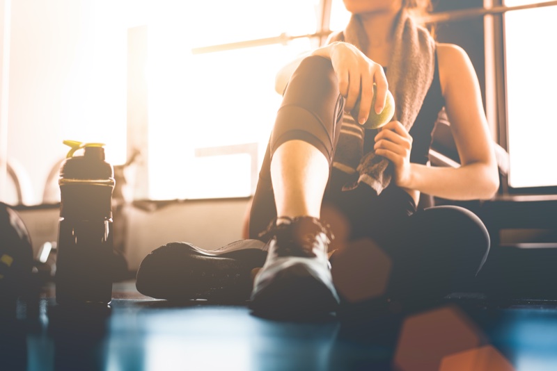 Cropped Woman Resting Gym Water Bottle