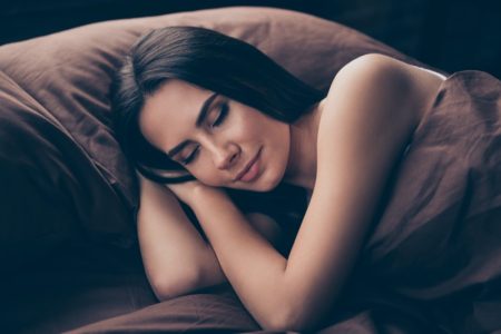 Top Solutions That Will Help You Get Rid Of Your Sleeping Troubles Dark Haired Woman Pretty Sleeping Brown Sheets