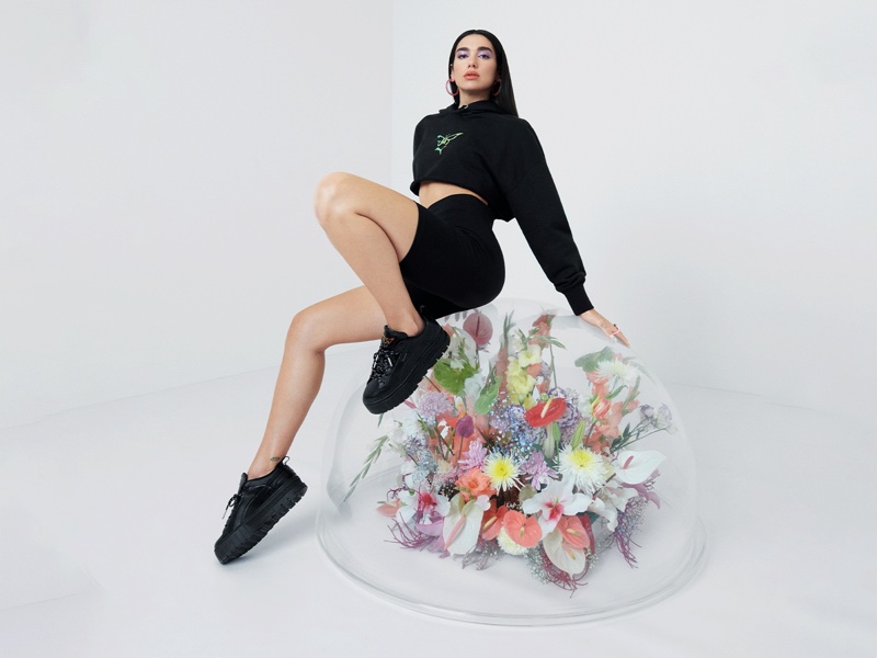 Dressed in black, Dua Lipa fronts PUMA Flutur campaign. Photo: Daniel Sannwald / PUMA