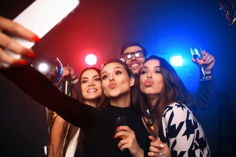 Friends at Club Posing for Selfie