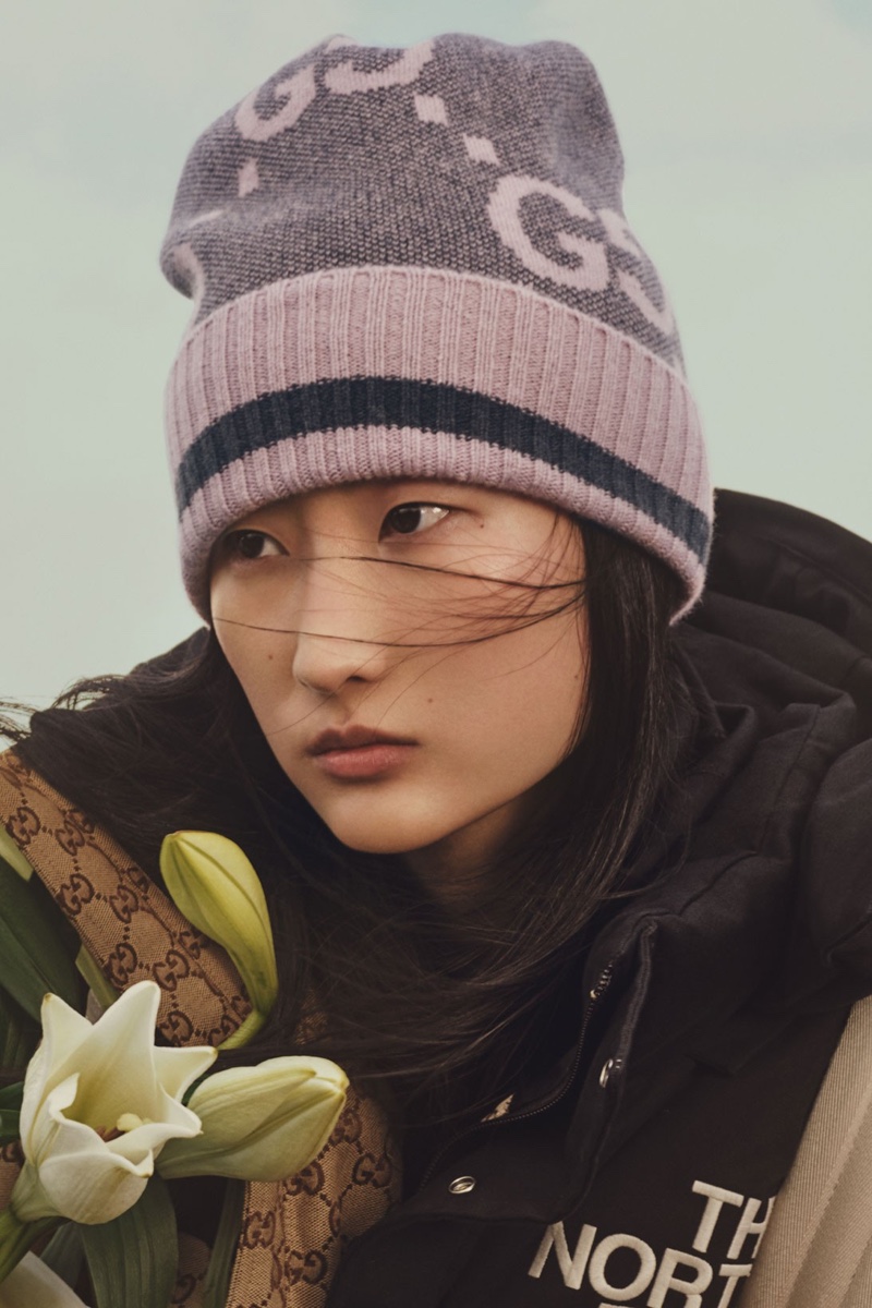 A model poses in rom The North Face x Gucci Chapter 2 campaign.