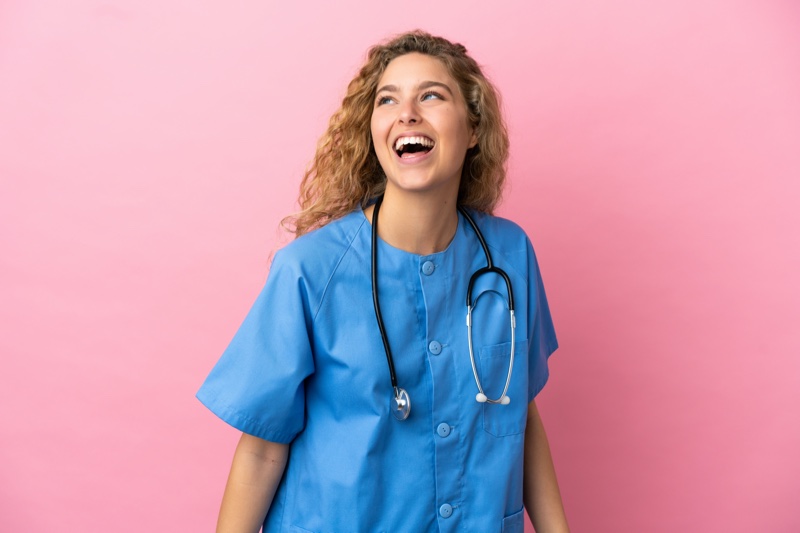 Happy Female Doctor Blue Scrubs Stethoscope