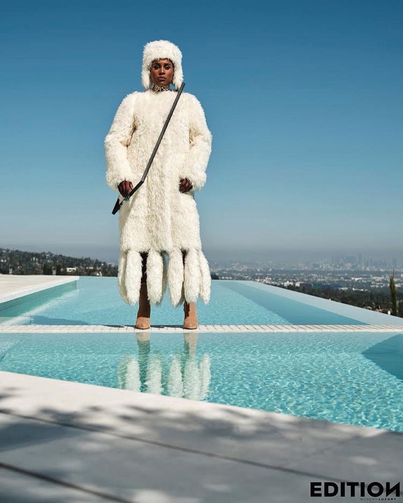 Posing poolside, Issa Rae wears Burberry designs. Photo: JD Barnes / Edition