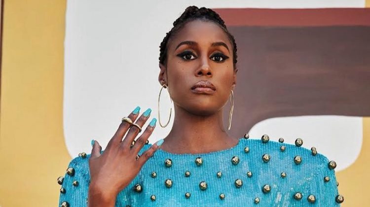 Issa Rae poses in Gucci dress with Khiry hoop earrings. Photo: JD Barnes / Edition