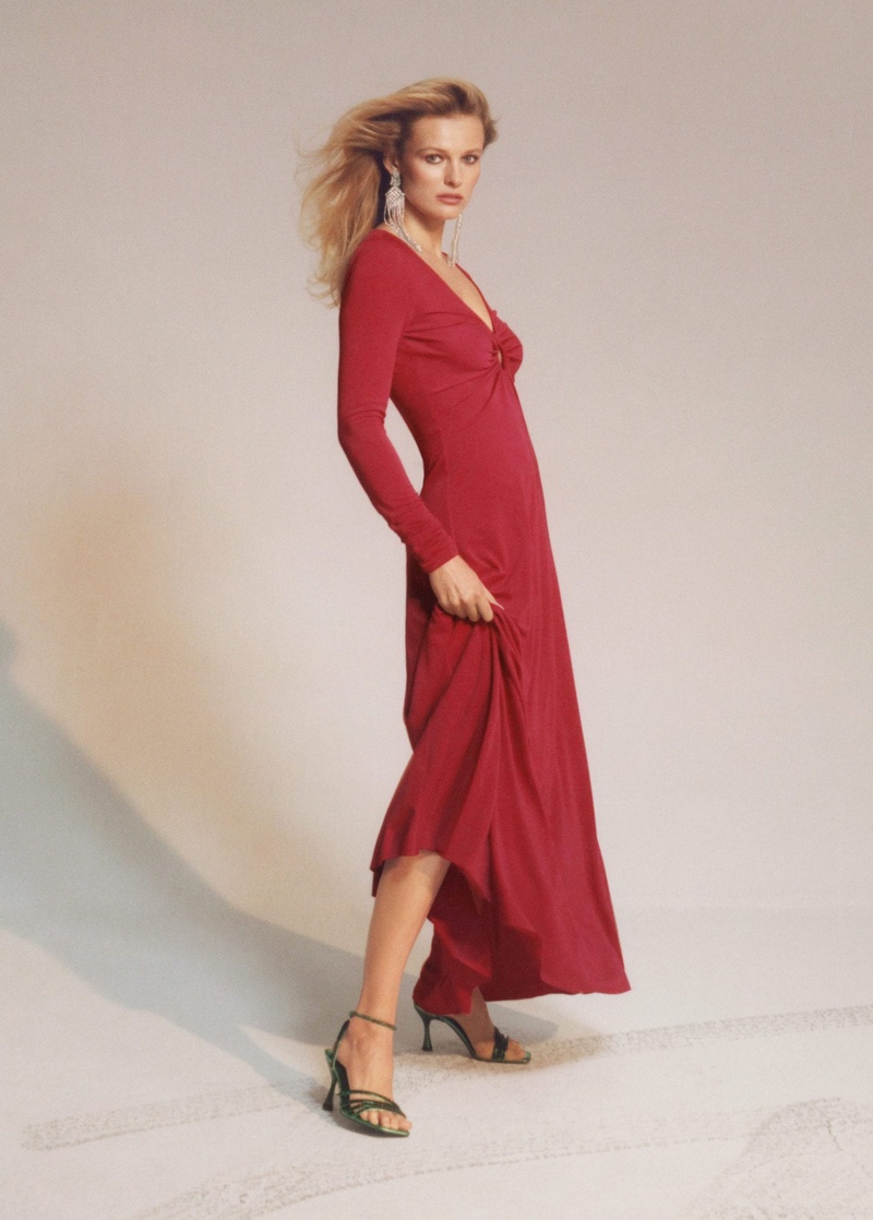 Wearing red, Edita Vilkeviciute poses in Mango side slit long dress.