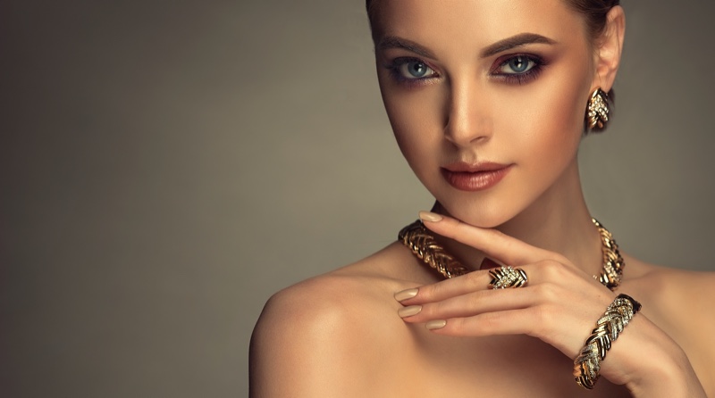Model Glamorous Jewelry Gold Earring Ring Bracelet Necklace