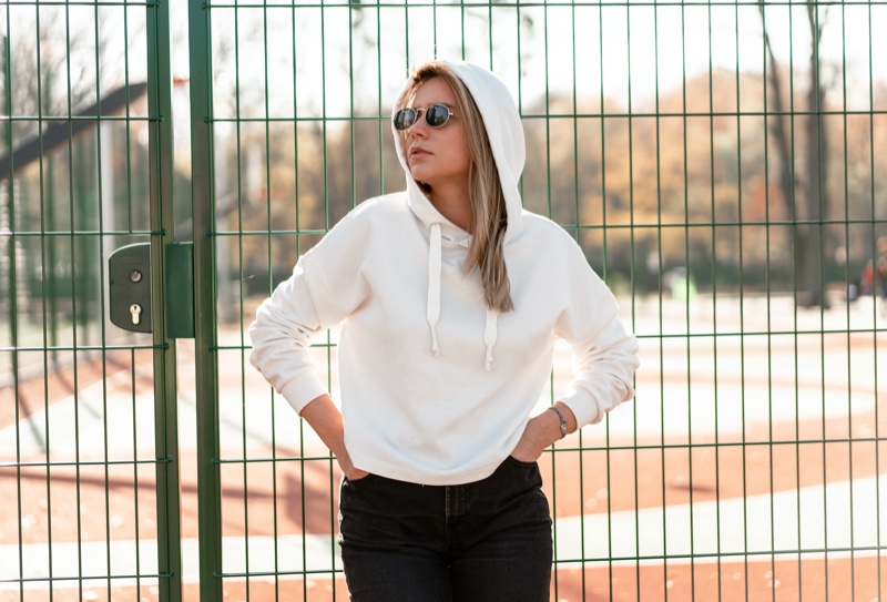 Woman White Hoodie Posing Fence