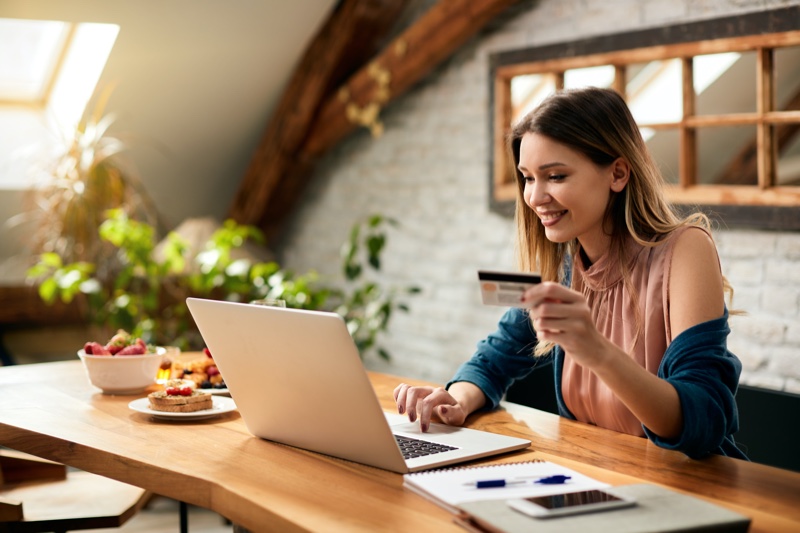 Young Woman Happy Credit Card Laptop