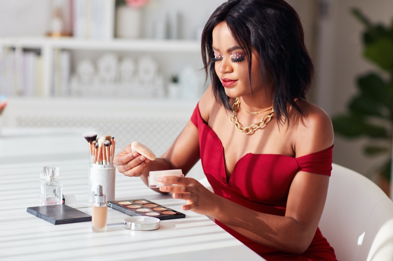 Black Woman Red Dress Makeup Table