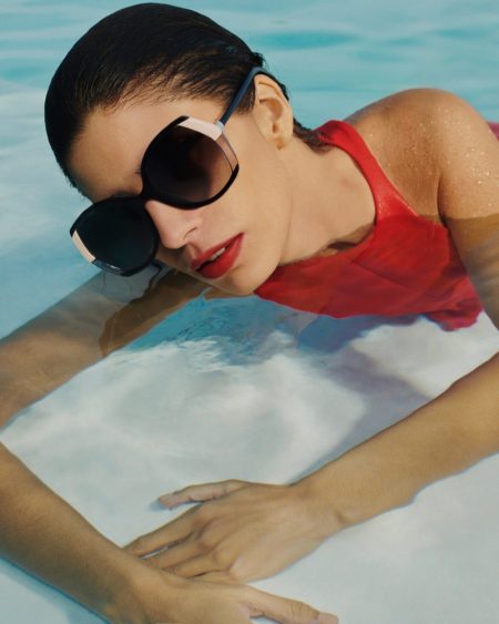 Mica Arganaraz Takes a Dip in Carolina Herrera Spring 2022 Eyewear Carolina Herrera Butterfly Sunglasses Pool Mica Arganaraz