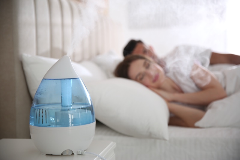 Couple Sleeping Humidifier Room