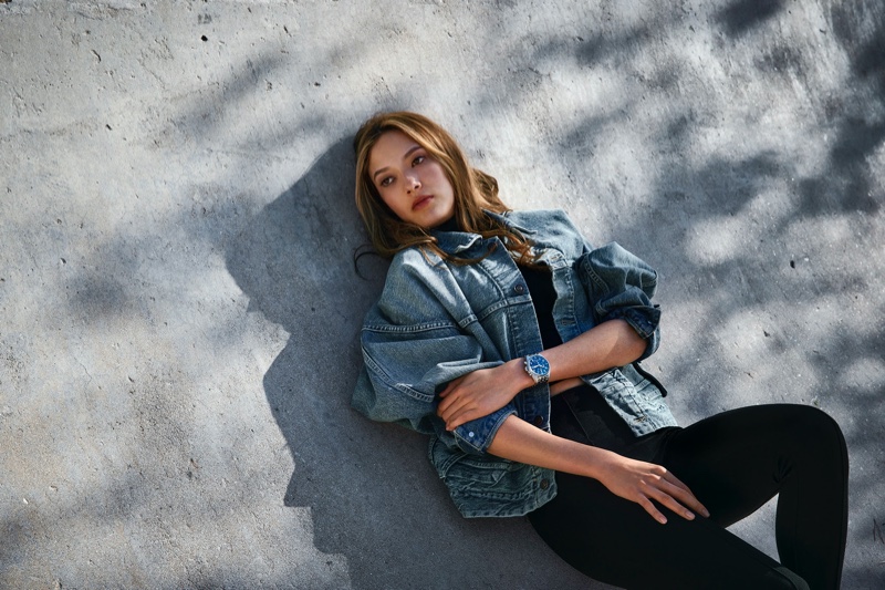 The skier poses in a skatepark for IWC Schaffhausen campaign