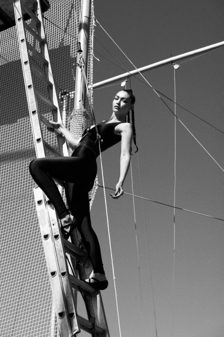 Gigi Hadid Reaches New Heights for V Magazine Gigi Hadid wears Saint Laurent bodysuit with Capezio shoes. | Photo Credit: Courtesy of V Magazine / Mario Sorrenti
