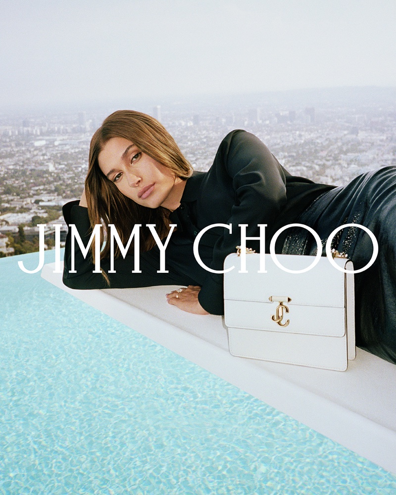 Modeling poolside, Hailey Bieber fronts Jimmy Choo spring 2022 campaign