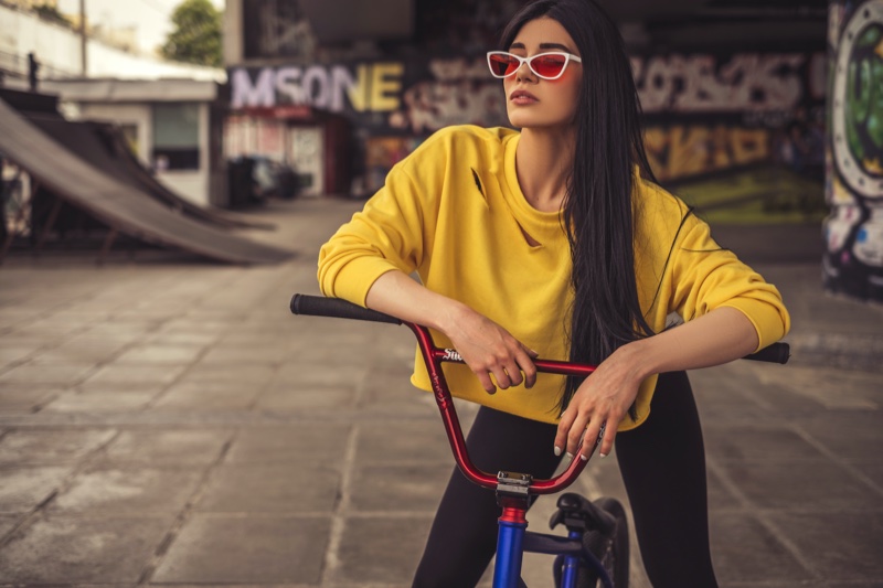 Model Bicycle Yellow Top Sunglasses Skate Park