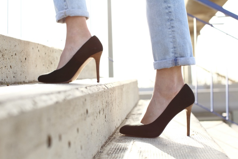 Woman Black Stiletto Heels Walking Stairs