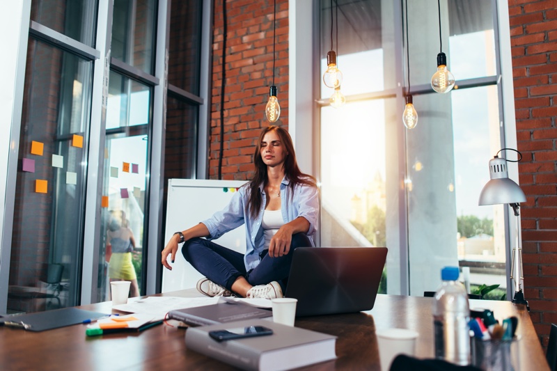 Woman Meditating Lotus Pose Office Desk