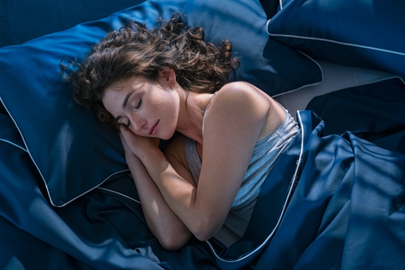 Woman Sleeping Blue Sheets Pillow