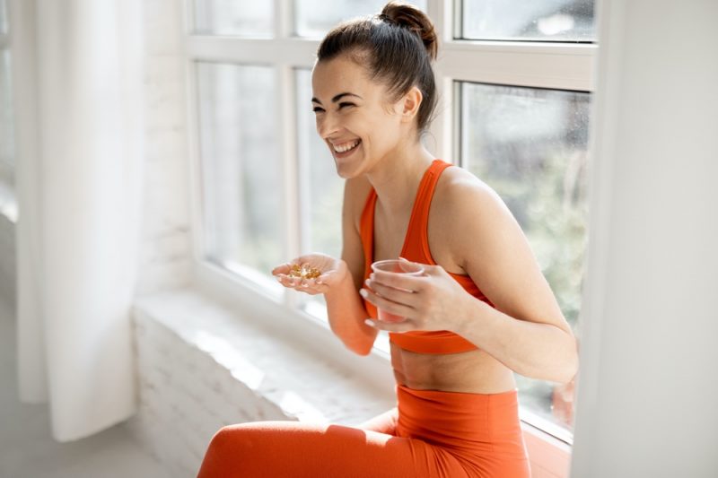 Woman Taking Supplements