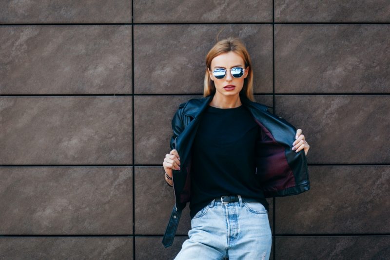 Woman Wearing Black T-shirt with Jeans and Bomber Jacket