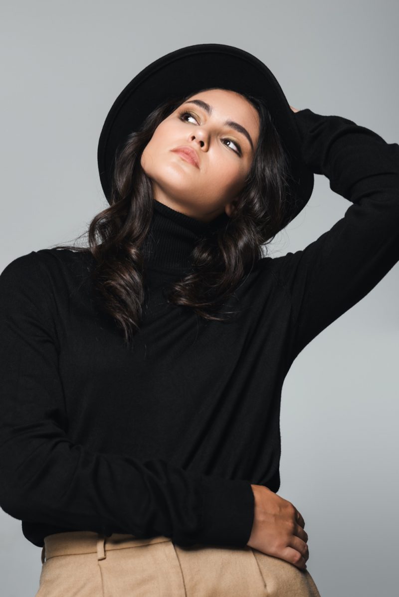 Woman Wearing Fedora Black Turtleneck