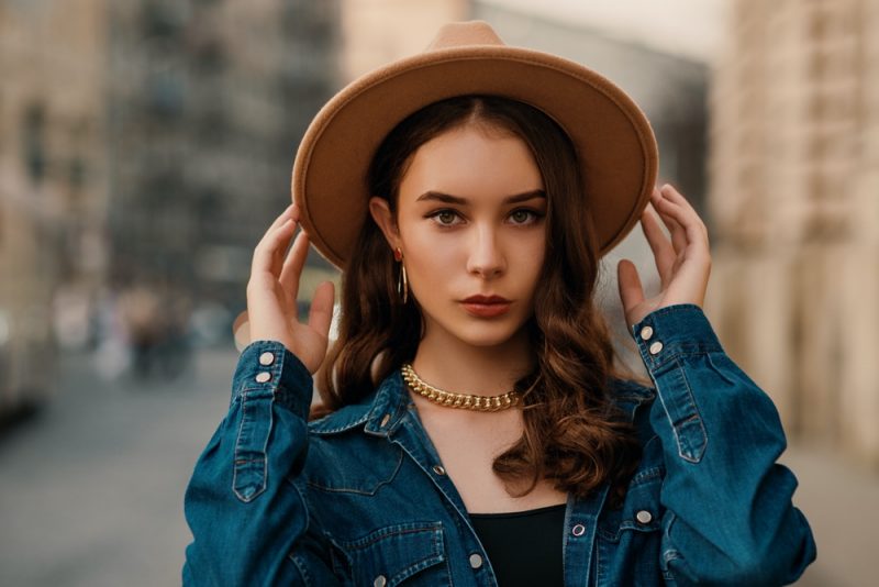 Woman Wearing Gold Chain Necklace