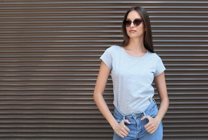 Woman Wearing Gray T-shirt with Jeans