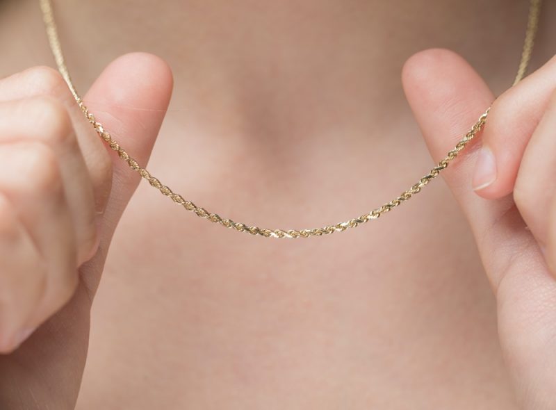Woman Wearing Simple Gold Chain Necklace